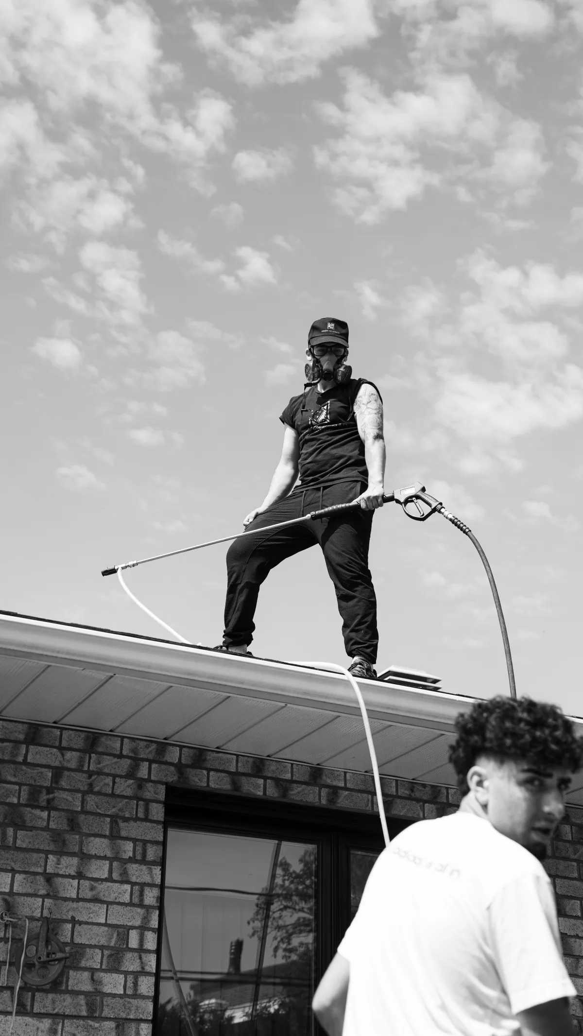 Rooftop pressure washing in black and white